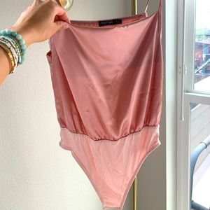 Light pink, satin body suit! Never worn